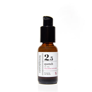 Skincare serum bottle labeled '2.5 quench' on a white background