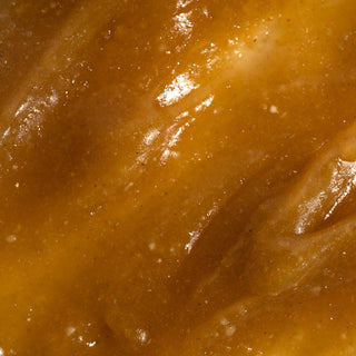 Golden glossy texture of Manuka Honey face mask