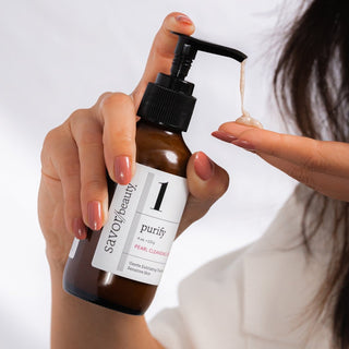 Pearl Cleansing cream being dispensed onto hands